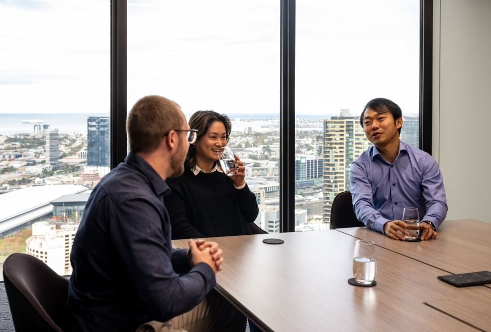 white & case Nolan meeting with colleagues 