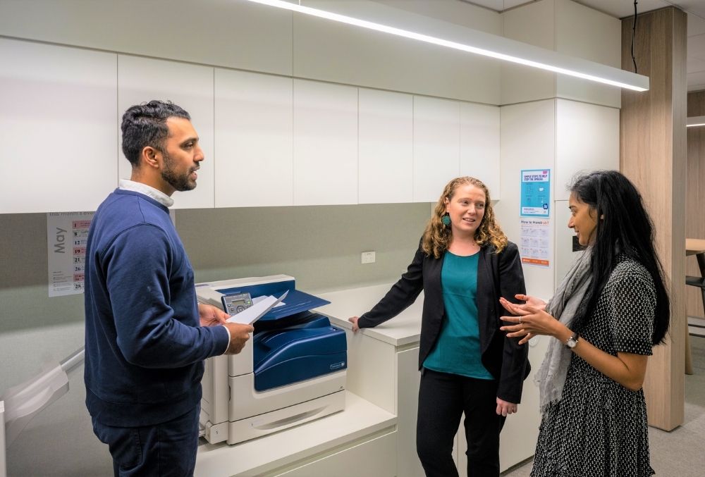 white & case Mikaylie discussion with her colleagues 